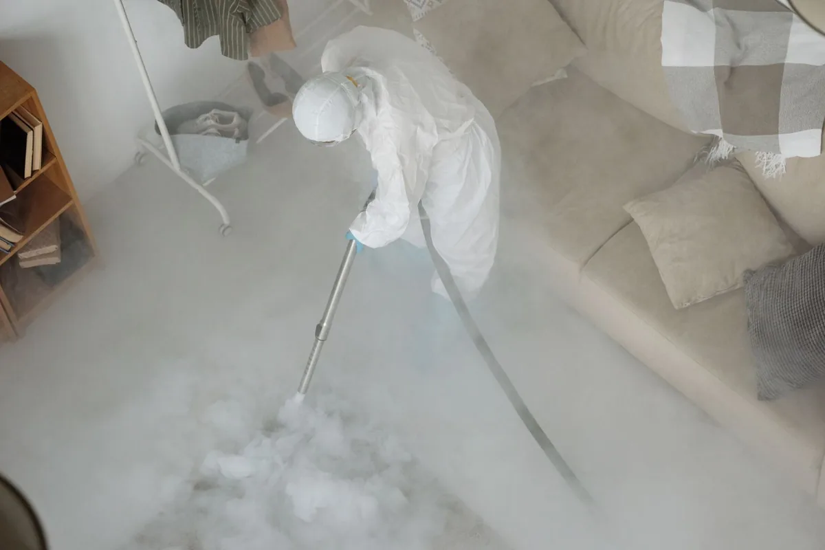 Biohazard cleanup technician in protective equipment, Tampa Overlook, Tampa, FL